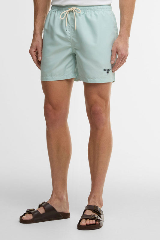 Wasserreaktive Badeshorts mit Blattdruck