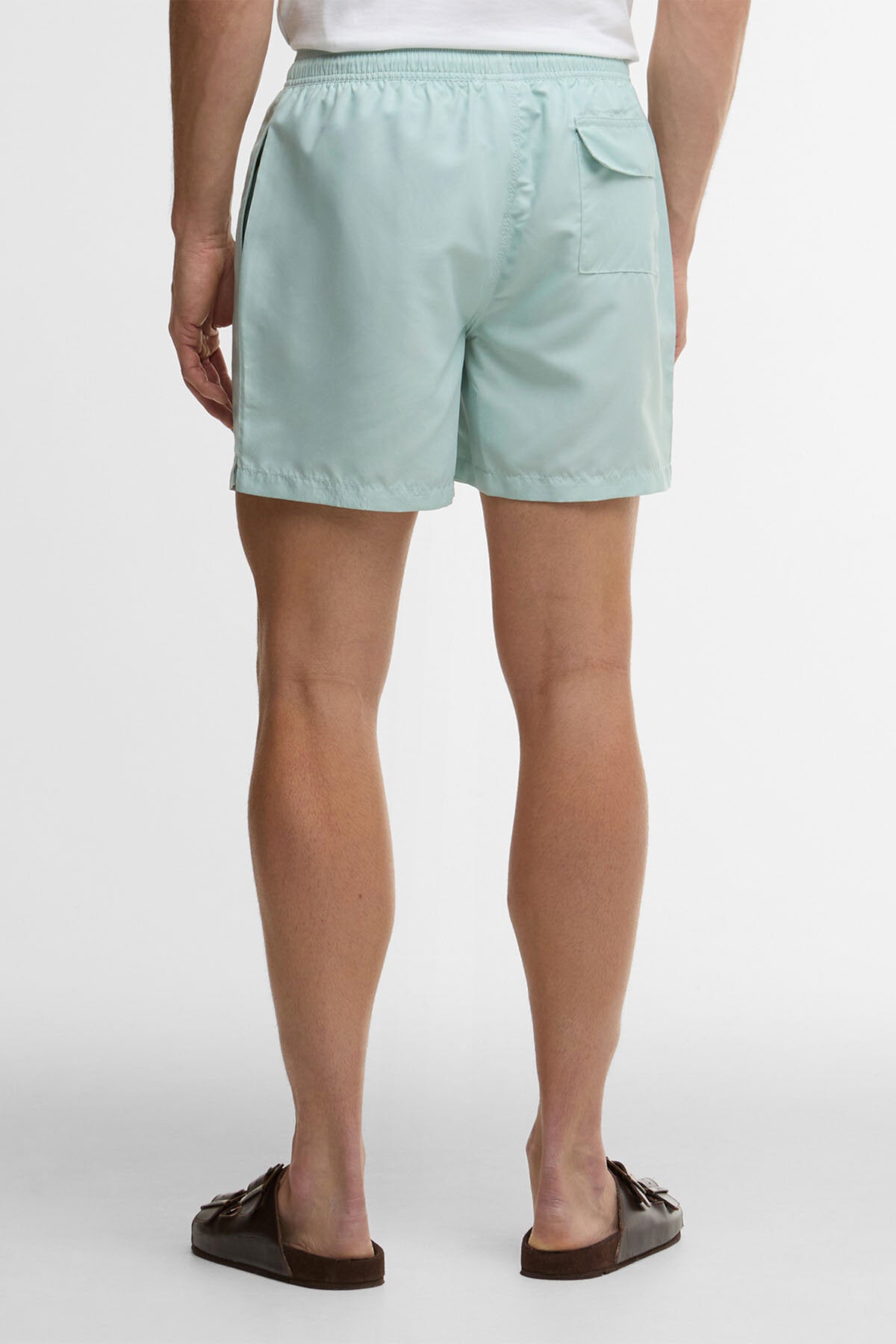 Wasserreaktive Badeshorts mit Blattdruck